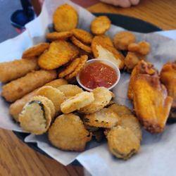 Hugo's Restaurant & Sports Bar - Their sampler.. wings, mozzarella sticks, fried shrimp, fried pickles, buffalo chips