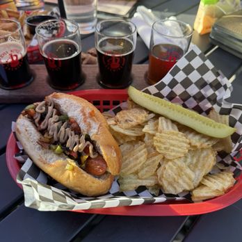 Devil's Kettle Brewing - Classic hotdog with grilled peppers, onion, and mustard. - Breweries Near Me - Athens, Ohio