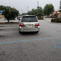 State Taxi - He couldn't even drive off with out driving through all these open spots he could of parked in.