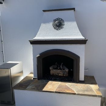 American Best Remodeling - Outdoor fireplace by the pool - General Contractors Near Me American Best Remodeling - Outdoor fireplace by the pool - General Contractors Near Me