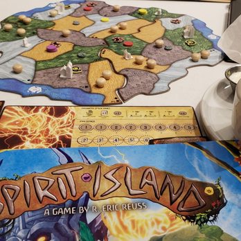 Shuffles: Board Game Cafe - Enjoying a game of Spirit Island - Bars Near Me - Tulsa, Oklahoma