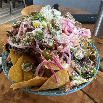 Cle Elum Taps & Tapas - Half size nachos. The two of us could not finish. Very tasty! - Beer, Wine & Spirits Near Me - Cle Elum, Washington Cle Elum Taps & Tapas - Half size nachos. The two of us could not finish. Very tasty! - Beer, Wine & Spirits Near Me - Cle Elum, Washington