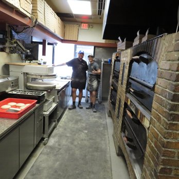 East Coast Pizza - The Pizza making crew and the famous brick ovens!! - Pizza Near Me - Riverview, Florida