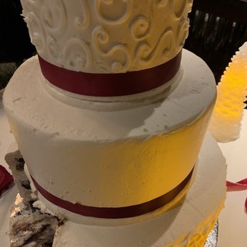 Angela's Eccentric Kitchen - Overall the cake was good but for a 590.00 cake I would have expected the ribbons to be lined evenly wrapped around the cake... - Bakeries Near Me - Santee, California