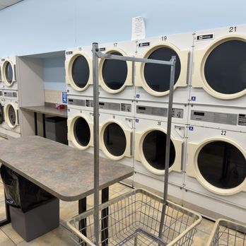Esposito's Laundromat - 22 Maytag large capacity dryers line up one side of the laundromat. - Laundromat Near Me - Wallington, New Jersey