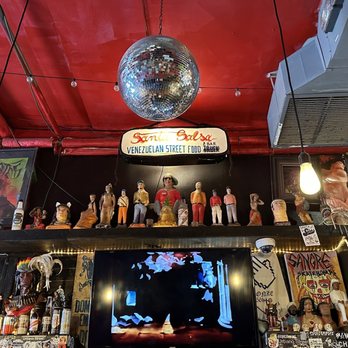 Santa Salsa - a disco ball hanging from the ceiling - Venezuelan Near Me - Brooklyn, New York