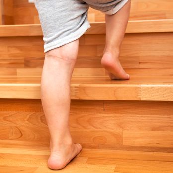 Duncan Remodeling - a child walking up the stairs - Flooring Near Me Duncan Remodeling - a child walking up the stairs - Flooring Near Me