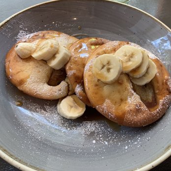 Babu's Bakery & Coffeehouse - Pancakes with bananas - Cafes Near Me - Zürich, ZH Babu's Bakery & Coffeehouse - Pancakes with bananas - Cafes Near Me - Zürich, ZH