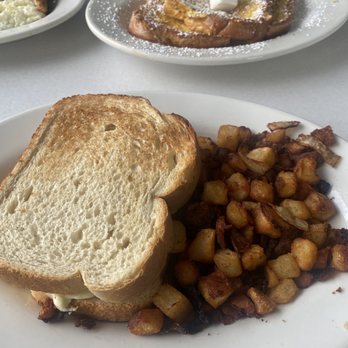 Victoria's Diner - Egg And Cheese Sandwich on Sourdough + extra crispy homefries - Diners Near Me - Boston, Massachusetts Victoria's Diner - Egg And Cheese Sandwich on Sourdough + extra crispy homefries - Diners Near Me - Boston, Massachusetts