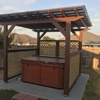 Sir Henry Enterprises - a hot tub in the backyard - Fences & Gates Near Me Sir Henry Enterprises - a hot tub in the backyard - Fences & Gates Near Me