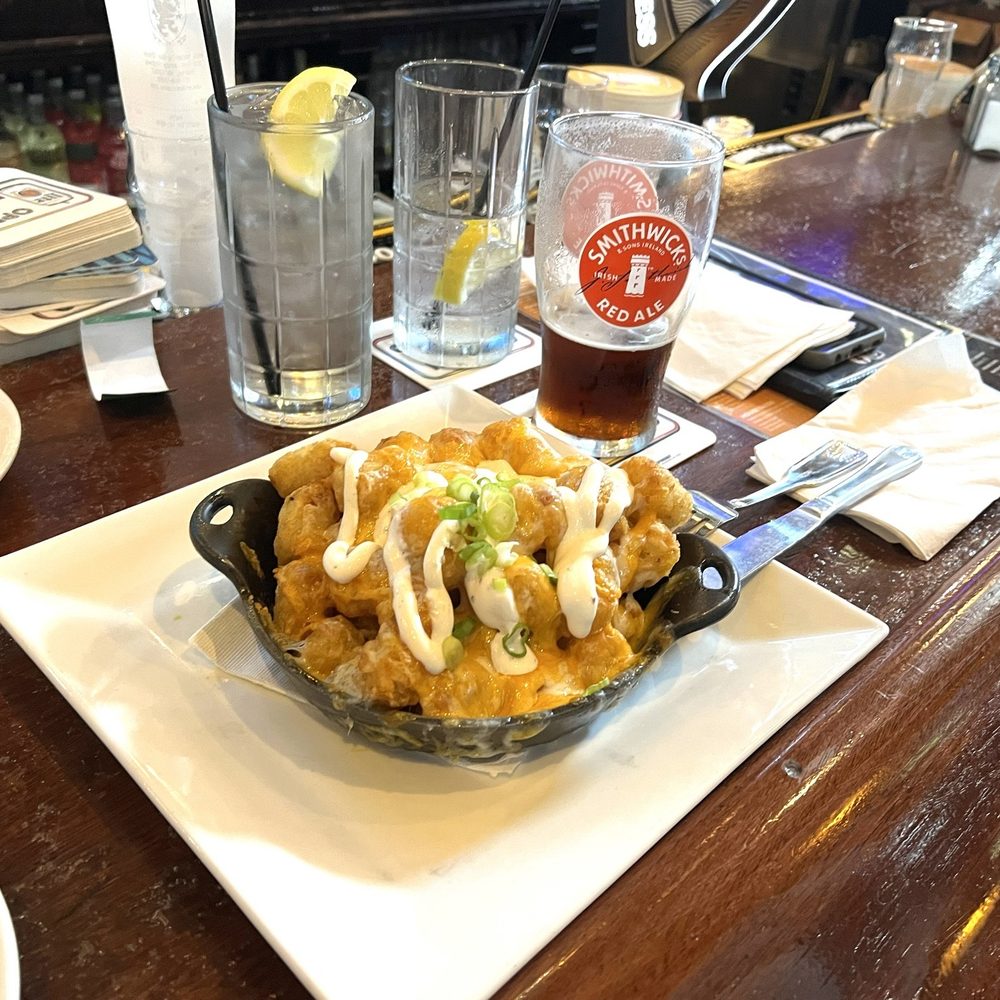 Mick Morgan's - Tater Tots-cheddar-Jack cheese, scallions. - Irish Pub Near Me - Sharon, Massachusetts Mick Morgan's - Tater Tots-cheddar-Jack cheese, scallions. - Irish Pub Near Me - Sharon, Massachusetts