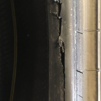 Heiser Chevrolet Cadillac - Here is the slash on the bead. Was it improper mounting method on the tire machine? The slash was over 90 degrees around. - Auto Repair Near Me - West Bend, Wisconsin Heiser Chevrolet Cadillac - Here is the slash on the bead. Was it improper mounting method on the tire machine? The slash was over 90 degrees around. - Auto Repair Near Me - West Bend, Wisconsin