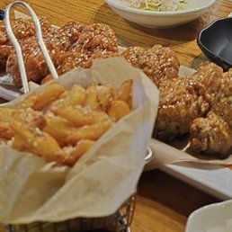 Chicken drumsticks and fries