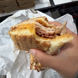 Ovengold turkey, turkey bacon, cheddar, and chipotle mayo on Dutch crunch bread