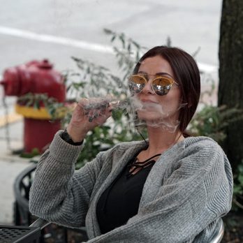 Whispers Cafe - Enjoying a smoke and a coffee at dusk. - Coffee & Tea Near Me - Chicago, Illinois