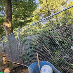 Two Men Fence Installation