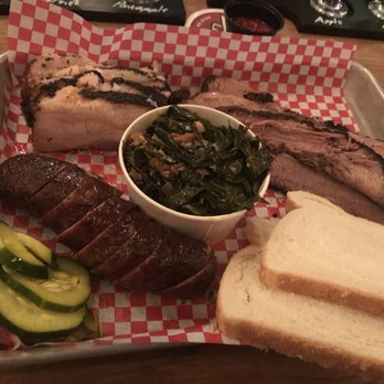 Durk's Bar.B.Q - From bottom left: sausage, pork belly, mixed brisket (lean and fatty), and collard greens. - Barbeque Near Me - Providence, Rhode Island Durk's Bar.B.Q - From bottom left: sausage, pork belly, mixed brisket (lean and fatty), and collard greens. - Barbeque Near Me - Providence, Rhode Island