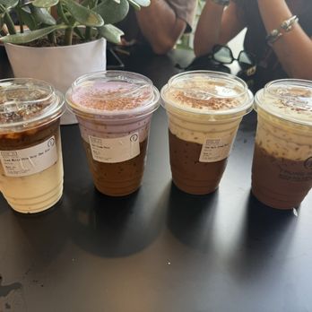 Trung Nguyen E Coffee - Left to right: iced white (bac siu), ube cream, sea salt cream, coconut cream - Coffee & Tea Near Me - Houston, Texas Trung Nguyen E Coffee - Left to right: iced white (bac siu), ube cream, sea salt cream, coconut cream - Coffee & Tea Near Me - Houston, Texas