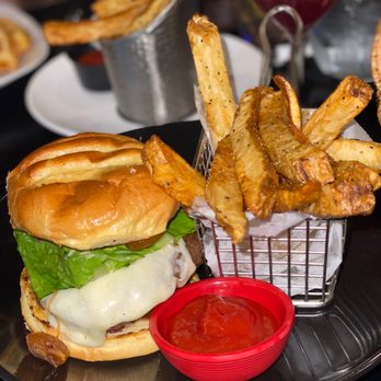 ININE Bistro - a burger and fries on a plate - Waffles Near Me - New York, New York ININE Bistro - a burger and fries on a plate - Waffles Near Me - New York, New York