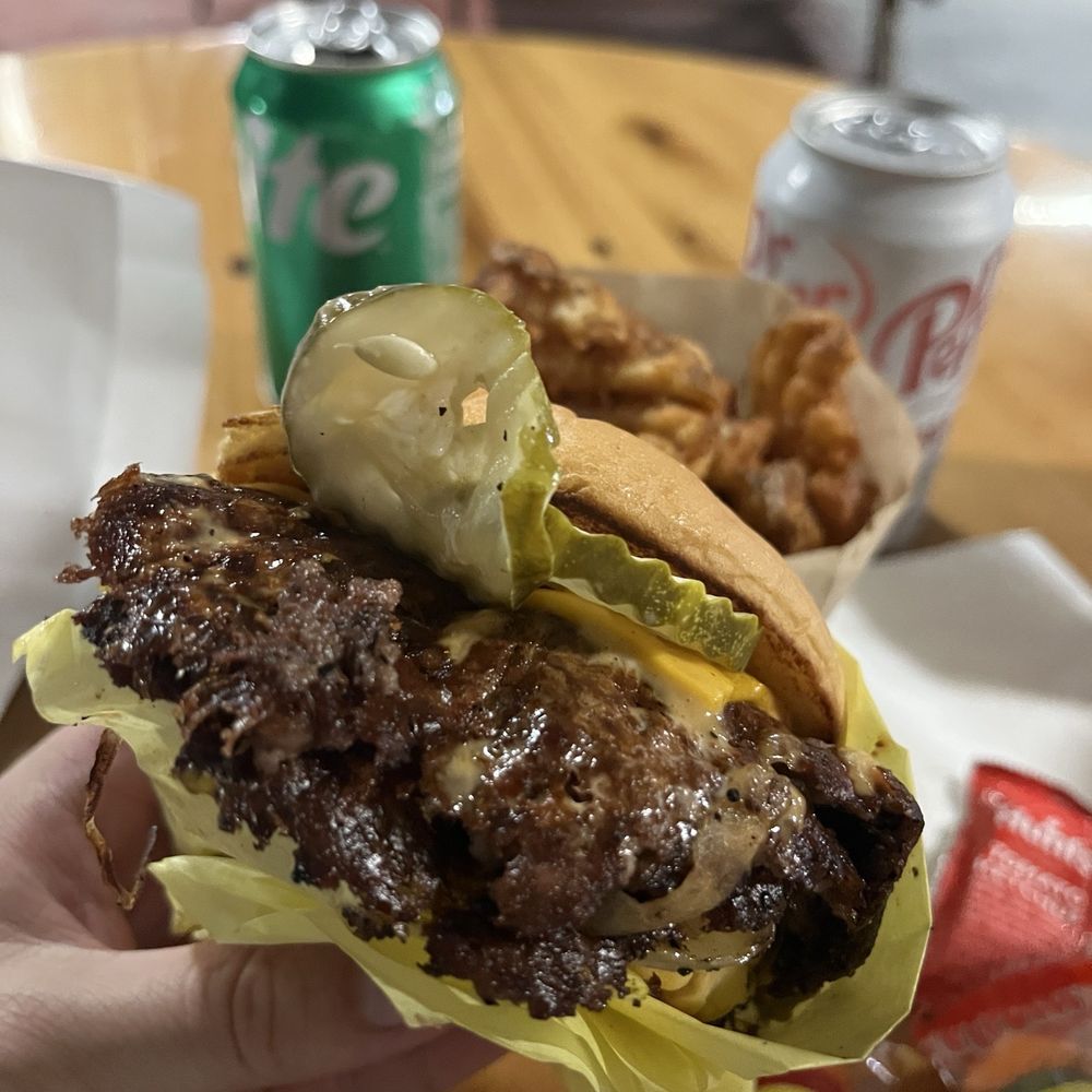 Smack Burger: two patties, cheese, grilled onions, pickles, smack sauce