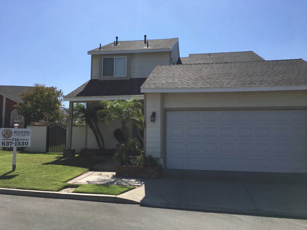 Slide of TG Roofing and Roof Removal