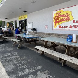Exterior outside entrance of Tom's Pizza - DeLand, Florida Exterior outside entrance of Tom's Pizza - DeLand, Florida