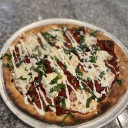 Dough Bros Woodfire Kitchen - Margarita pizza? We ordered the "Short Dawg" but this is what we ended up getting-still tasted pretty good.