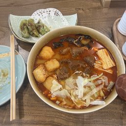 Beef brisket Mala rice noodles and fried gyoza