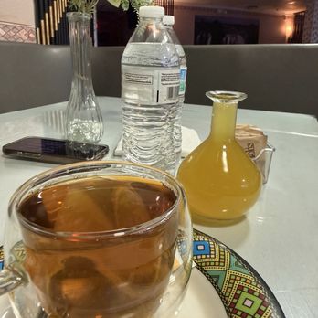 Lucy Ethiopian Restaurant - Ethiopian tea with areki (ouzo), Ethiopian honey wine (tej) - Ethiopian Near Me - Los Angeles, California Lucy Ethiopian Restaurant - Ethiopian tea with areki (ouzo), Ethiopian honey wine (tej) - Ethiopian Near Me - Los Angeles, California