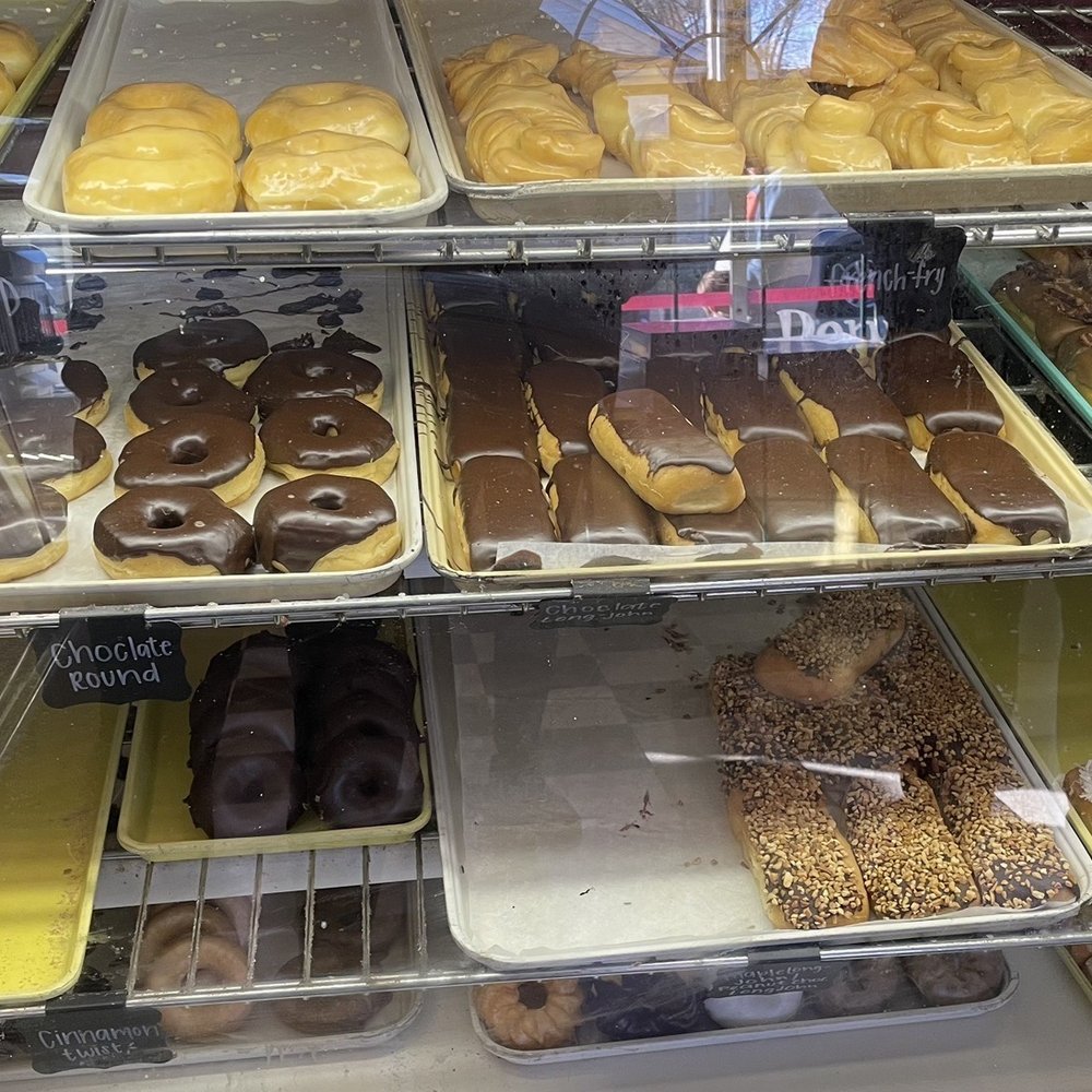Nord's Bakery - Left to right, top to bottom Glazed, French fry Choc iced, choc iced long Johns, maple and bacon - Bakeries Near Me - Louisville, Kentucky Nord's Bakery - Left to right, top to bottom Glazed, French fry Choc iced, choc iced long Johns, maple and bacon - Bakeries Near Me - Louisville, Kentucky
