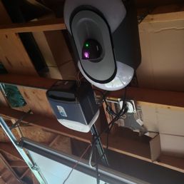 Installed 2 garage door openers. Opposite side garage doors.  Chamberlain chain and iq camera