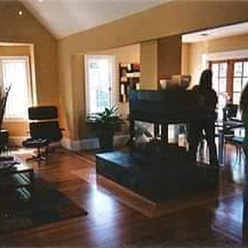 California Custom Construction - a living room with a piano - General Contractors Near Me - Daly City, California
