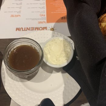 Cafe Momentum Dallas - Apple butter and butter with bread basket - New American Near Me - Dallas, Texas Cafe Momentum Dallas - Apple butter and butter with bread basket - New American Near Me - Dallas, Texas