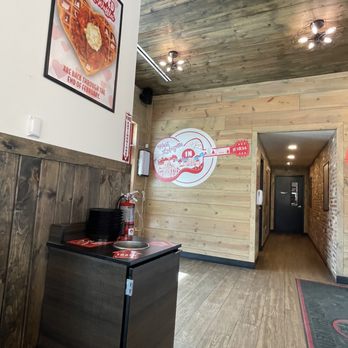 Slim Chickens - Entrance and restrooms - American Near Me - West Lafayette, Indiana