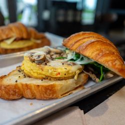 Specialty's Cafe & Bakery - egg spinach mushroom croissant $5.25