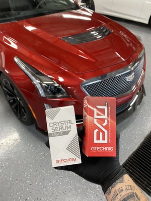 2017 Cadillac CTS-V - Our ceramic application is generally a 4-5 day process. It includes a full exterior detail (hand wash, iron X decontamination, full clay bar, cleaning of the door jams and windows) and full paint correction (restoring and rejuvenating the paintwork of a vehicle, through a two stage cut and polish process to eliminate any surface imperfections, that dull, oxidize, or haze the surface by reflecting light off in various directions, therefore detracting from a true and proper, clean, sharp, reflection. These imperfections include things like swirl marks & fine scratches, bird dropping etching & acid rain etching, hologramming & buffer trails, and random isolated deep scratches.). Once the correction is complete we then polish the paint to bring out the paint’s gloss. We apply 2 layers of ceramic to the painted body, headlights, tail lights, moldings, grill, etc. Everything except the glass windows. Last, the ceramic will need to cure for 24 hours. 2017 Cadillac CTS-V - Our ceramic application is generally a 4-5 day process. It includes a full exterior detail (hand wash, iron X decontamination, full clay bar, cleaning of the door jams and windows) and full paint correction (restoring and rejuvenating the paintwork of a vehicle, through a two stage cut and polish process to eliminate any surface imperfections, that dull, oxidize, or haze the surface by reflecting light off in various directions, therefore detracting from a true and proper, clean, sharp, reflection. These imperfections include things like swirl marks & fine scratches, bird dropping etching & acid rain etching, hologramming & buffer trails, and random isolated deep scratches.). Once the correction is complete we then polish the paint to bring out the paint’s gloss. We apply 2 layers of ceramic to the painted body, headlights, tail lights, moldings, grill, etc. Everything except the glass windows. Last, the ceramic will need to cure for 24 hours.