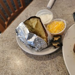 Rumors Sports Bar & Grill - Soft and fluffy  baked potato.