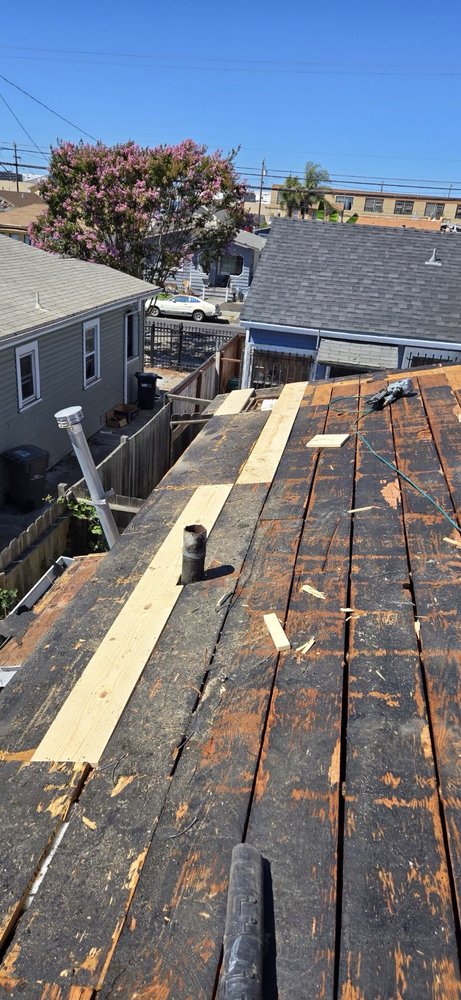 Slide of Astro Roofing