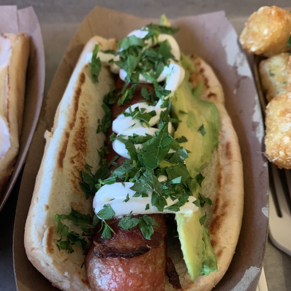 Crif Dogs - The chihuahua dog: Bacon wrapped dog topped with sour cream and avocado - Hot Dogs Near Me - New York, New York