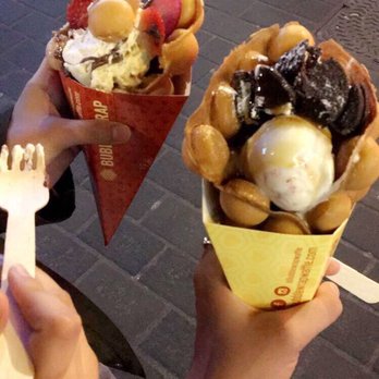 Bubblewrap Waffle - Left to right: vanilla ice cream with strawberries and Nutella, strawberry cheesecake ice cream with Oreos and salted caramel sauce. - Waffles Near Me - London, XGL Bubblewrap Waffle - Left to right: vanilla ice cream with strawberries and Nutella, strawberry cheesecake ice cream with Oreos and salted caramel sauce. - Waffles Near Me - London, XGL