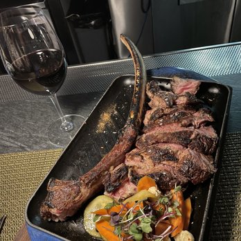 Wicked Butcher - Dry age Tomahawk steak - Bars Near Me - Fort Worth, Texas