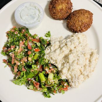 Peace Bakery & Deli - Falafel, tahni baba ganoush, tabouli, and tzatziki sauce (this is 1/2 of a falafel plate portion wise) - Mediterranean Near Me - Austin, Texas Peace Bakery & Deli - Falafel, tahni baba ganoush, tabouli, and tzatziki sauce (this is 1/2 of a falafel plate portion wise) - Mediterranean Near Me - Austin, Texas