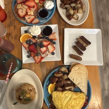 Café Kaila - Omelet, potatoes, buttermilk pancakes, croissant french toast, fried rice and link sausage - Breakfast & Brunch Near Me - Honolulu, Hawaii Café Kaila - Omelet, potatoes, buttermilk pancakes, croissant french toast, fried rice and link sausage - Breakfast & Brunch Near Me - Honolulu, Hawaii