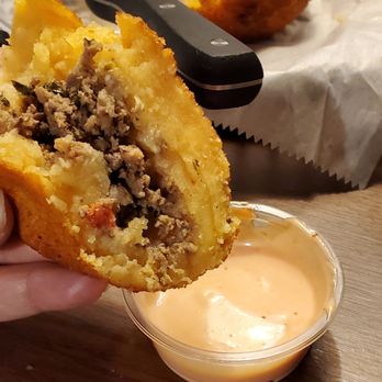 El Flamingo - rellenos de papa delicious packed with flavor. Garlic dipping sauce soooo good. - Sports Bars Near Me - Joliet, Illinois El Flamingo - rellenos de papa delicious packed with flavor. Garlic dipping sauce soooo good. - Sports Bars Near Me - Joliet, Illinois