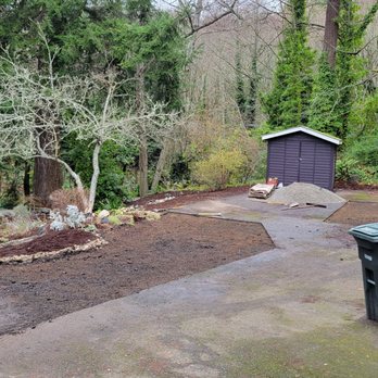 TRJ Construction - a driveway being built in the woods - Masonry/Concrete Near Me