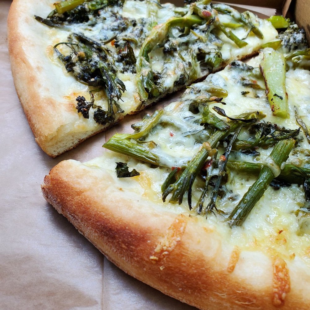 Pagliacci Pizza - Seasonal slice: Broccolini - Pizza Near Me - Bellevue, Washington Pagliacci Pizza - Seasonal slice: Broccolini - Pizza Near Me - Bellevue, Washington