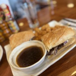 The District Kitchen And Saloon - Roast beef dip with tater tots