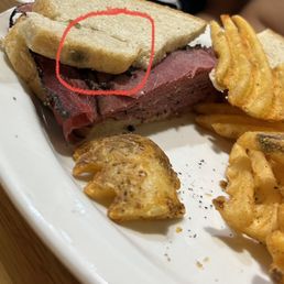 Pastrami sandwich, moldy bread.