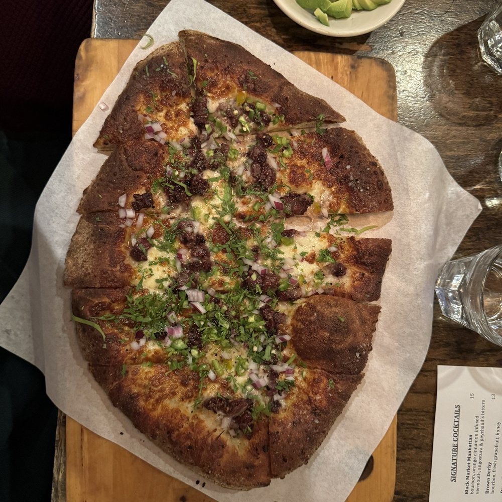Five Restaurant Bistro - Carne pizza with a side of avocado, so good! - Seafood Near Me - Edmonds, Washington