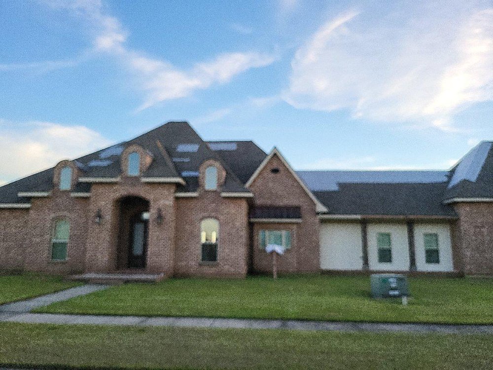 Slide of Performance 1 Roofing & Construction